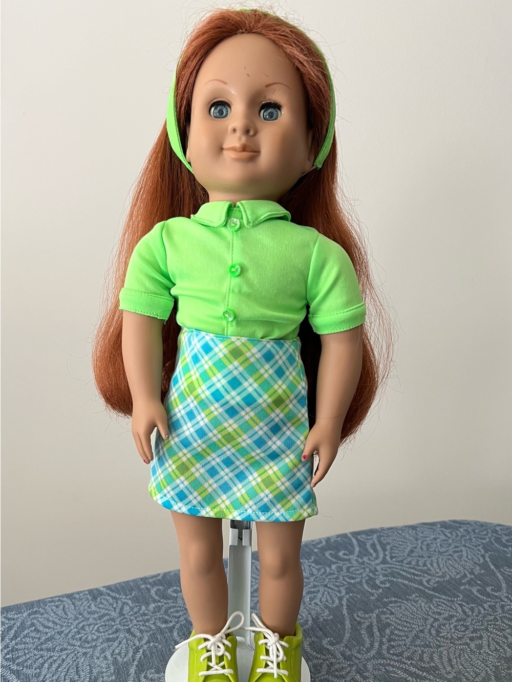 Green-Accented Fashion Doll with Plaid Blue-Green Skirt